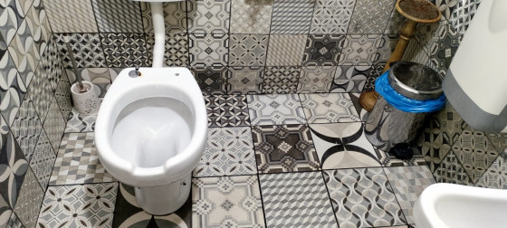 Туалет без стульчака в Sartoria Gastronomica